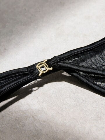 String di Next in nero