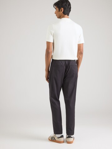 SCOTCH & SODA Tapered Trousers in Black: back
