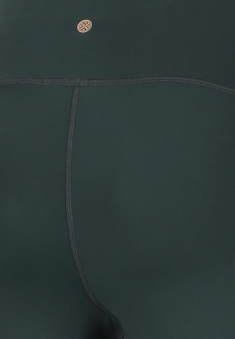 Athlecia Skinny Sports trousers 'FRANZ' in Green