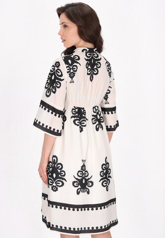 faina Jurk in Beige