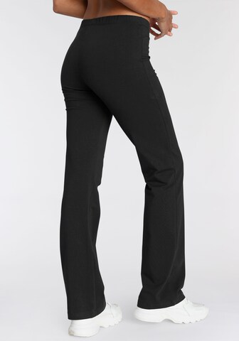 Evazați Pantaloni de la Champion Authentic Athletic Apparel pe negru