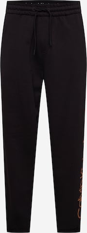 Calvin Klein Jeans - Tapered Pantalón en negro: frente