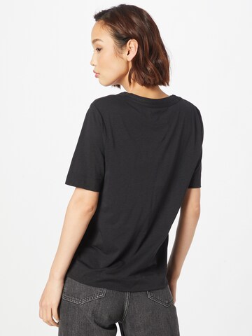 Whistles - Camiseta 'ROSA' en negro