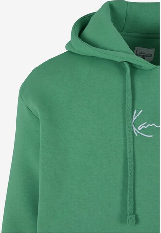 Sweat-shirt Karl Kani en vert