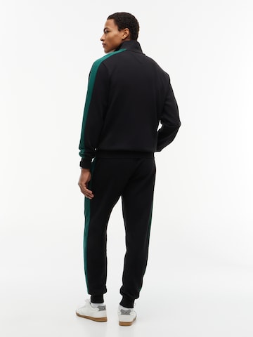 TOMMY HILFIGER Jogginganzug 'ESS' in Schwarz