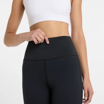 évasé Pantalon 'Harmony' new balance en noir