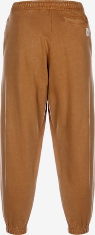 Effilé Pantalon Karl Kani en marron