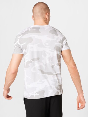 Coupe regular T-Shirt ALPHA INDUSTRIES en blanc