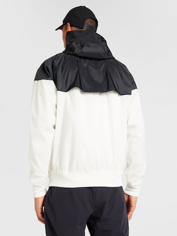 Nike Sportswear Between-season jacket in Beige