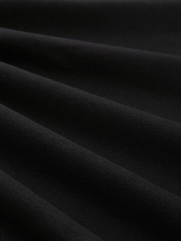 TOM TAILOR DENIMSweater majica 'Relaxed' - crna boja