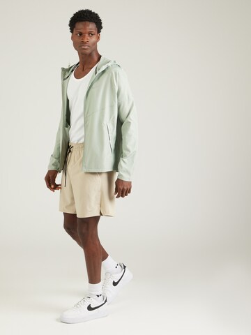 Giacca sportiva 'Miler' di NIKE in verde