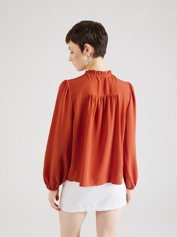 ABOUT YOU Blouse in Oranje