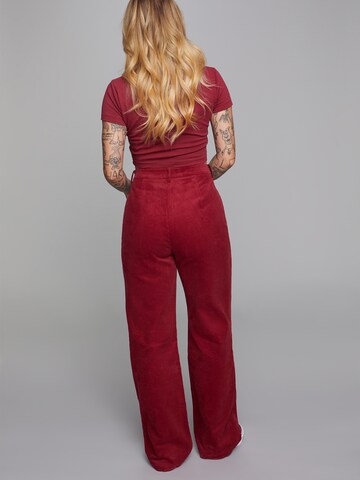 ABOUT YOU x Sharlota Flared Pants 'Mona' in Red