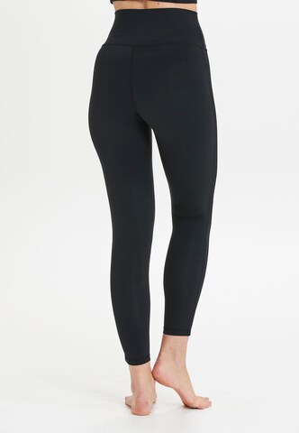 Athlecia Skinny Workout Pants 'Elinor' in Black