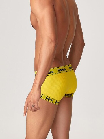 TAUWELL Boxer shorts 'Caution' in Yellow