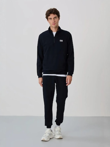 Tommy Life Huispak 'Aktive Sets' in Zwart: voorkant