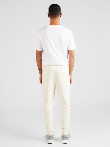 Tapered Pantaloni 'Doak' di HUGO in bianco