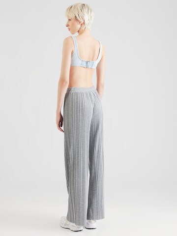 ABOUT YOU Wide leg Trousers 'Fabia' in Grey