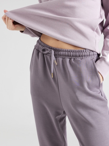 Tapered Pantaloni sportivi 'Jacey V2' di Athlecia in grigio