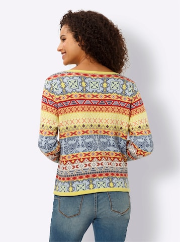 heine Neuletakki värissä keltainen