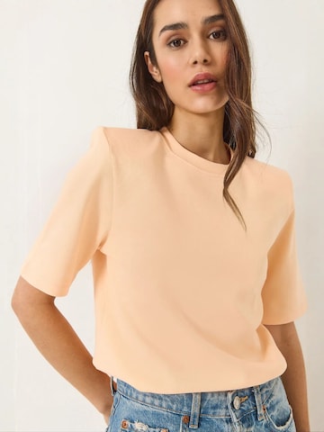 T-shirt 'T-Shirts' Bianco Lucci en orange : devant