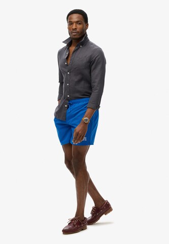Shorts de bain 'Essential' Superdry en bleu