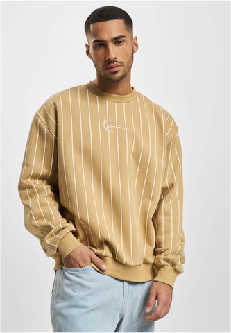 Karl Kani Sweatshirt i beige: framsida