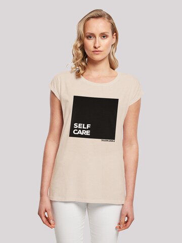 T-shirt 'SELF CARE' F4NT4STIC en beige : devant