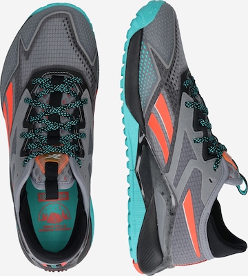 Scarpa sportiva 'Nano X2 TR Adventure' di Reebok in grigio