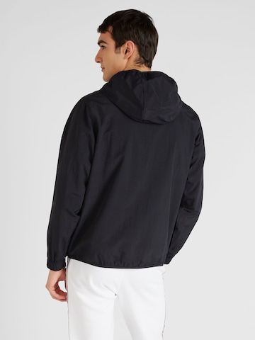 Champion Authentic Athletic Apparel Jacke in Schwarz