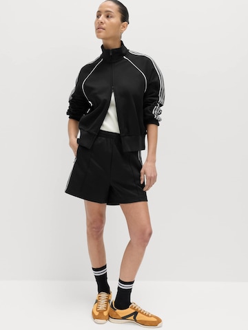 Marks & Spencer Trainingsjacke in Schwarz