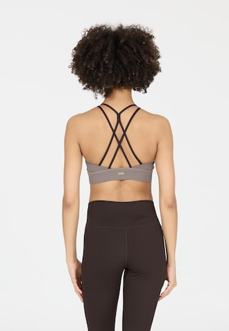 Athlecia Low Support Sport-BH 'Aspasia' in Braun