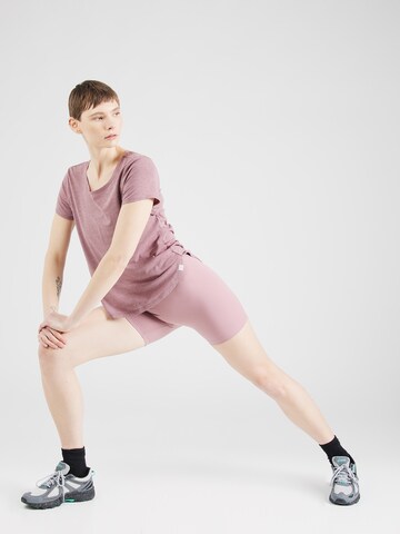 new balance Skinny Spodnie sportowe 'Sleek 5' w kolorze różowy