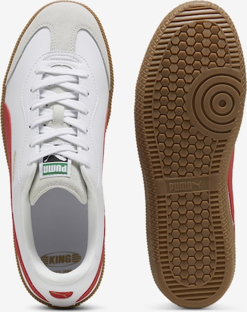 Chaussure de foot 'KING 21 IT' PUMA en blanc