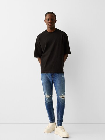 Bershka Slimfit Jeans i blå