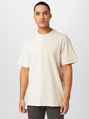 T-Shirt Karl Kani en beige : devant