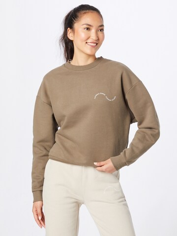 Comfort Studio by Catwalk Junkie Sweatshirt 'BE GOOD DO GOOD' in Groen: voorkant