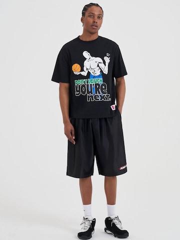 AND1 Paita värissä musta