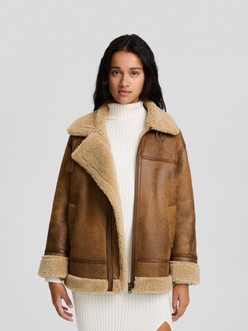 Bershka Winter jacket in Brown: front