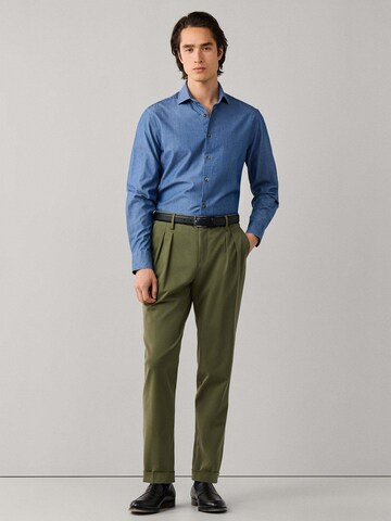 Tapered Pantaloni con pieghe di Hackett London in verde