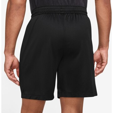 NIKE Loosefit Sporthose in Schwarz