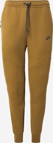Effilé Pantalon 'TCH FLC' Nike Sportswear en vert : devant