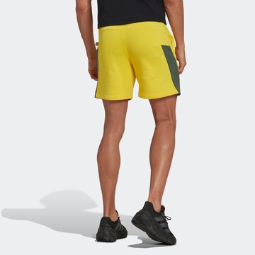 ADIDAS SPORTSWEAR Regular Workout Pants in Yellow