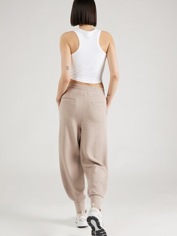 Tapered Pantaloni sportivi di Varley in beige