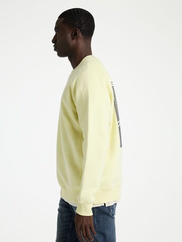 Sweat-shirt 'Ido ' CHASIN' en jaune