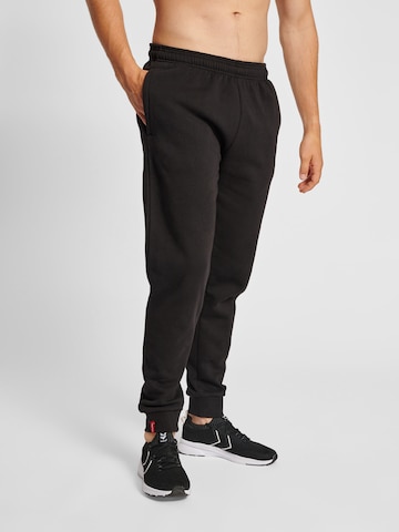 Hummel Tapered Pants in Black: front