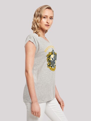 F4NT4STIC Shirt 'Harry Potter Hufflepuff Crest' in Grau
