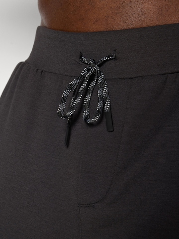 PUMA Tapered Sportbroek 'Cloudspun' in Zwart