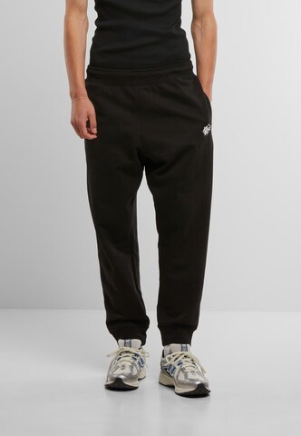 DEF Tapered Hose 'BEK ' in Schwarz: Vorderseite