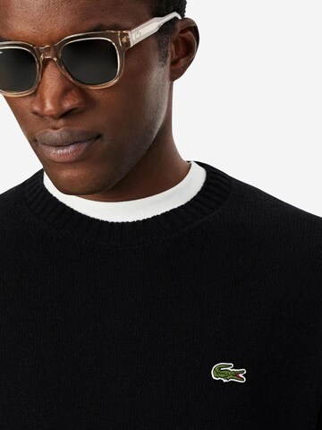 Pullover di LACOSTE in nero
